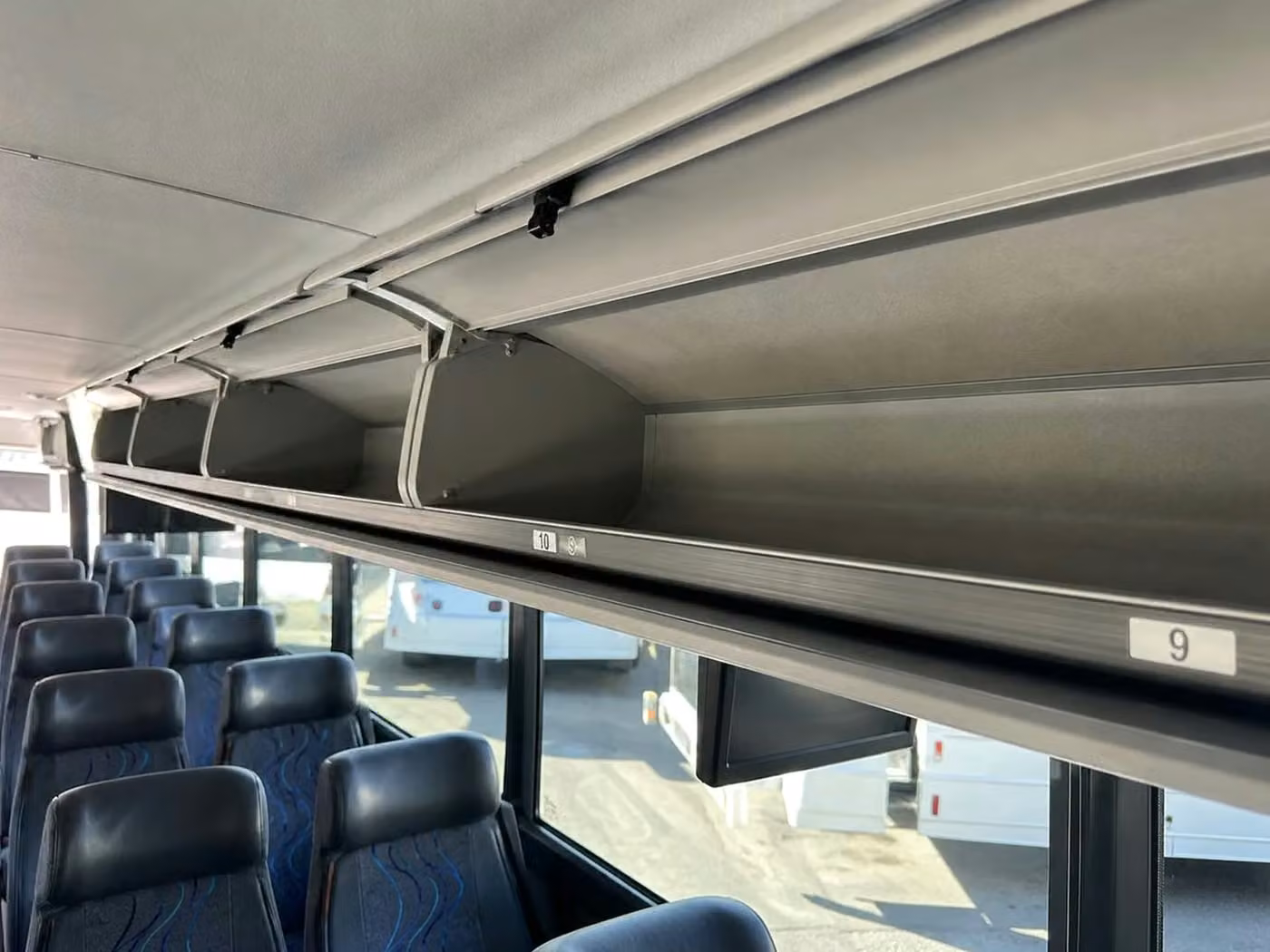 cedar falls 25 passenger minibus overhead storage