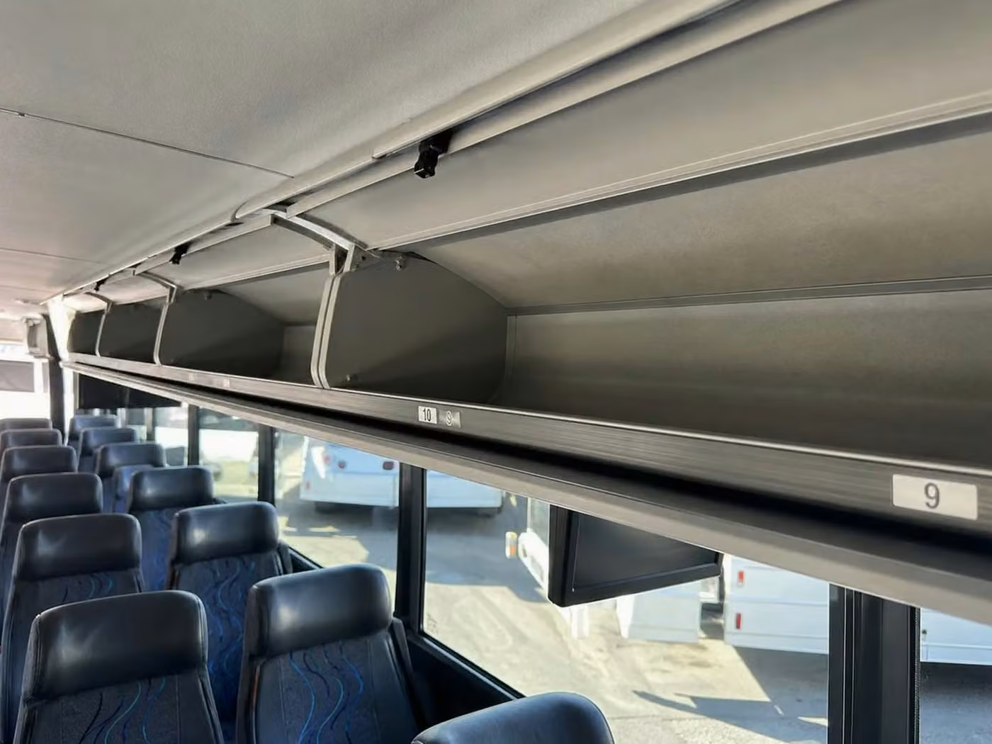 cedar falls 56 passenger charter bus overhead storage