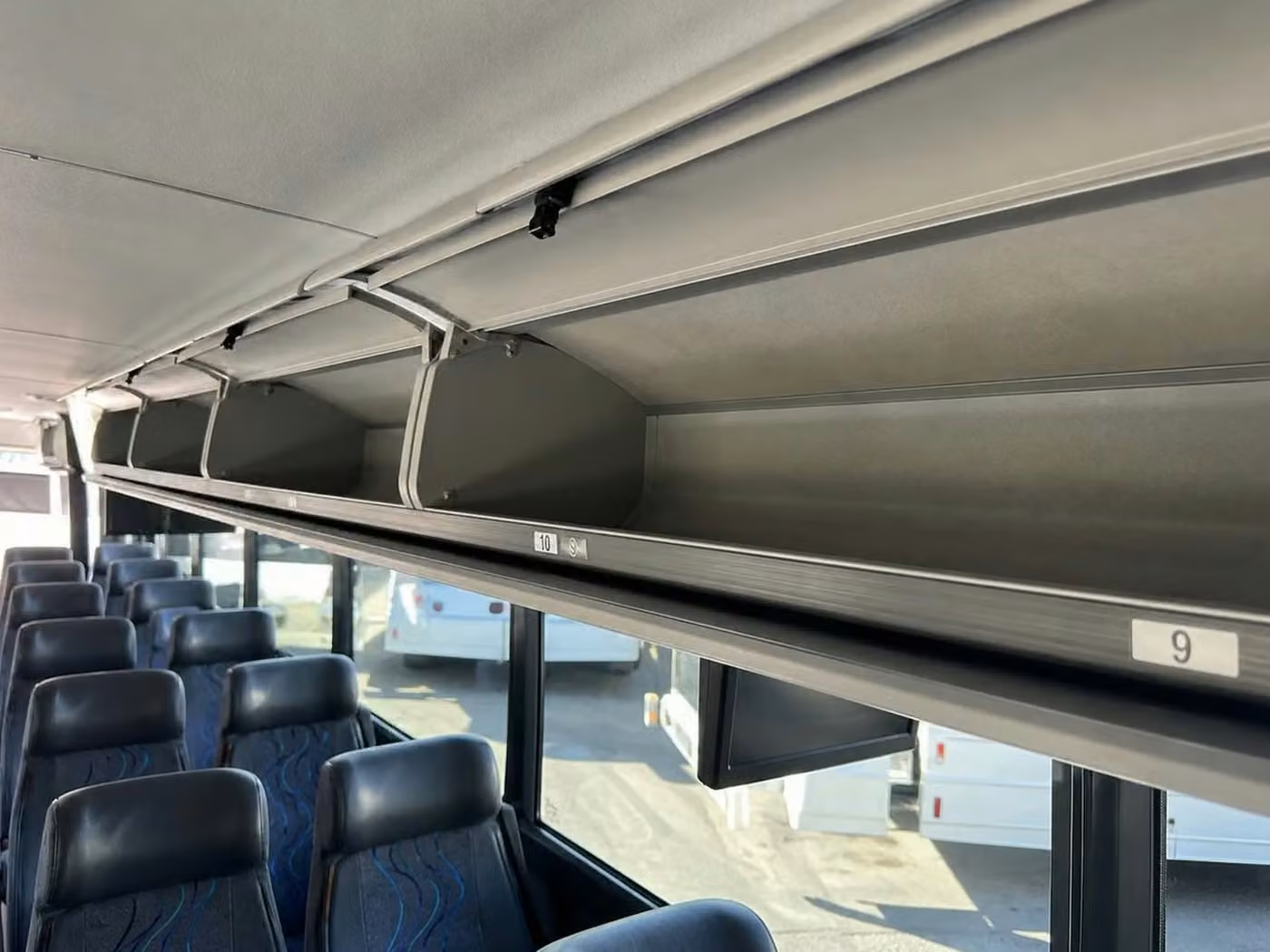 cedar falls charter bus overhead storage