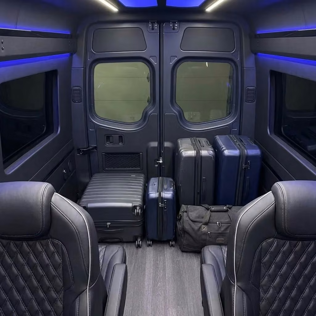 cedar falls sprinter van rental with driver luggage area